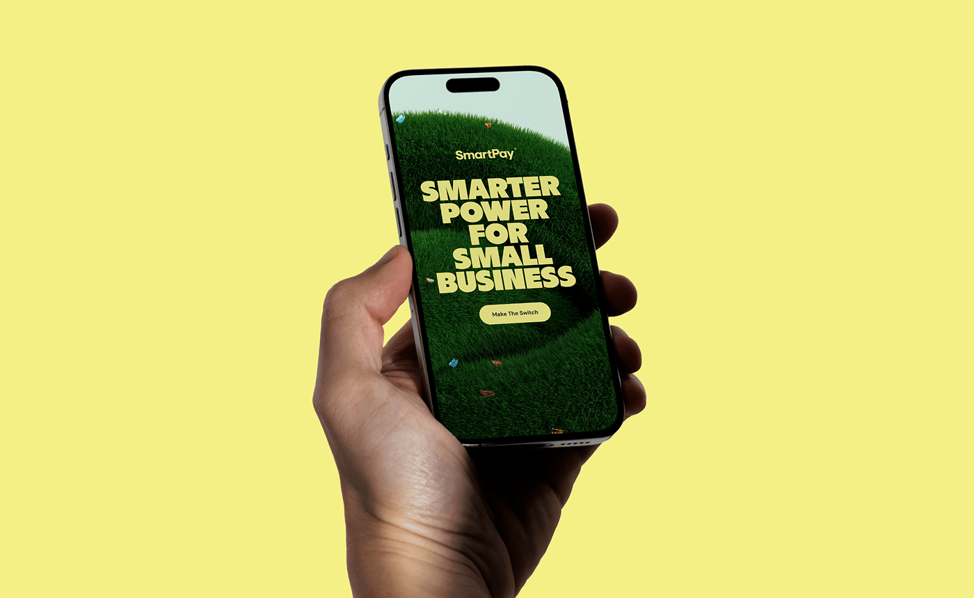 A SmartPay smartphone advertisement featuring the brand's tagline: "SMARTER POWER FOR SMALL BUSINESS"